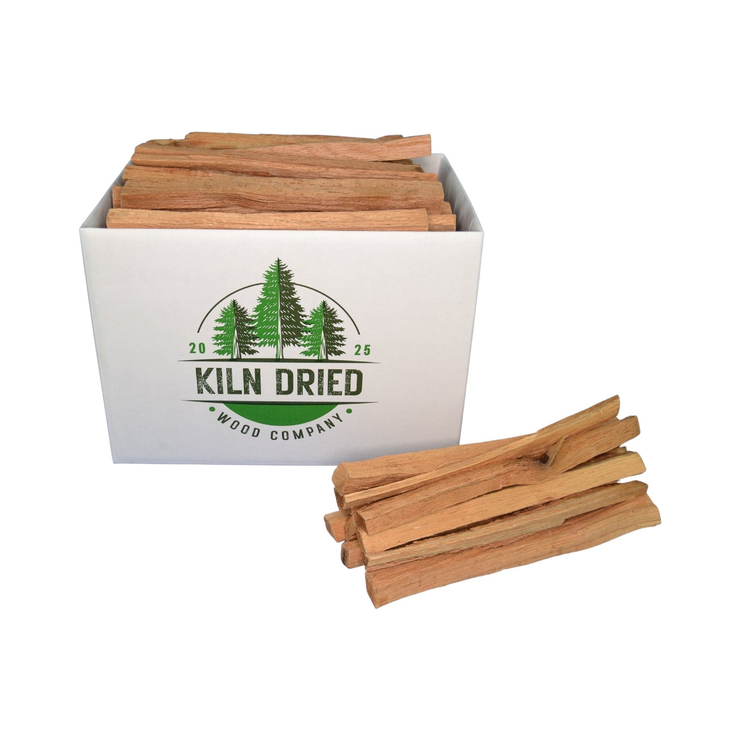 Mixed hardwood kindling in branded Kiln Dried Wood Company box with loose kindling on white background for fireplaces, wood stoves, fire pits, and fire starting