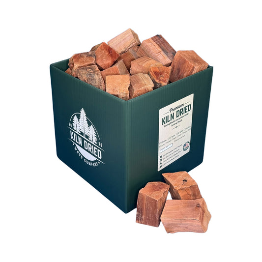 3-inch kiln-dried apple cooking wood chunks in branded Kiln Dried Wood Company box with loose apple wood chunks on white background for smokers, grills, and BBQ smoking
