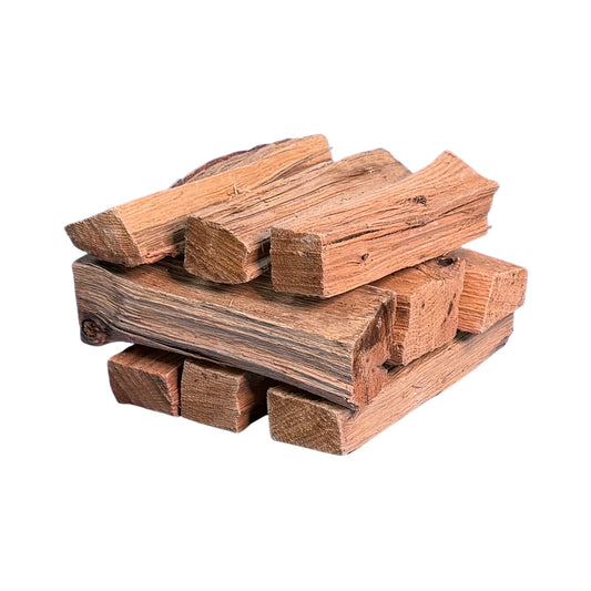 8-inch kiln-dried oak pizza mid splits stacked on a white background for wood-fired pizza ovens and live-fire cooking.